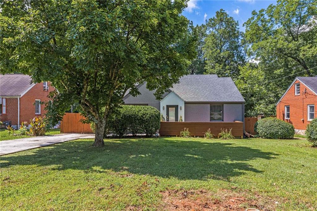 2005 Marco Drive Decatur, GA 30032 - Photo 1 of 1 a front view of house with yard and green space