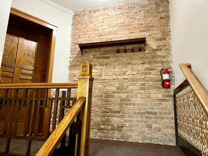 a view of door with wooden floor