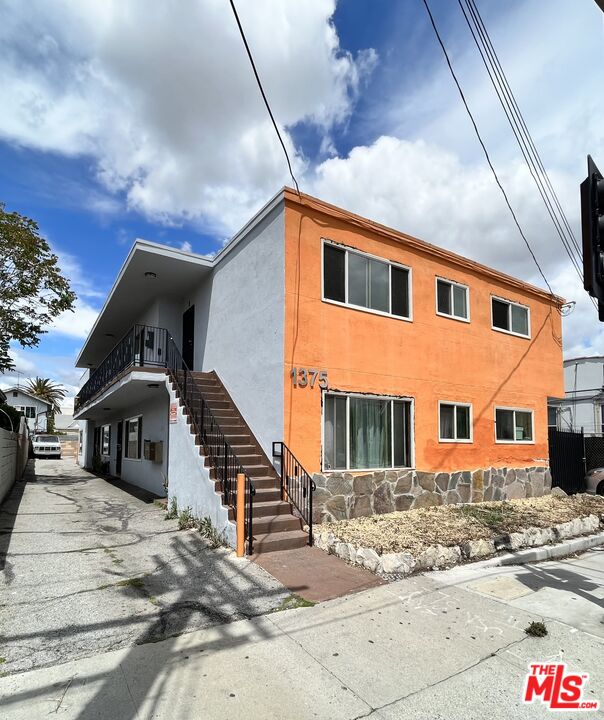1375 West 20th Street Los Angeles, CA 90007 - Photo 1 of 4 a front view of a house