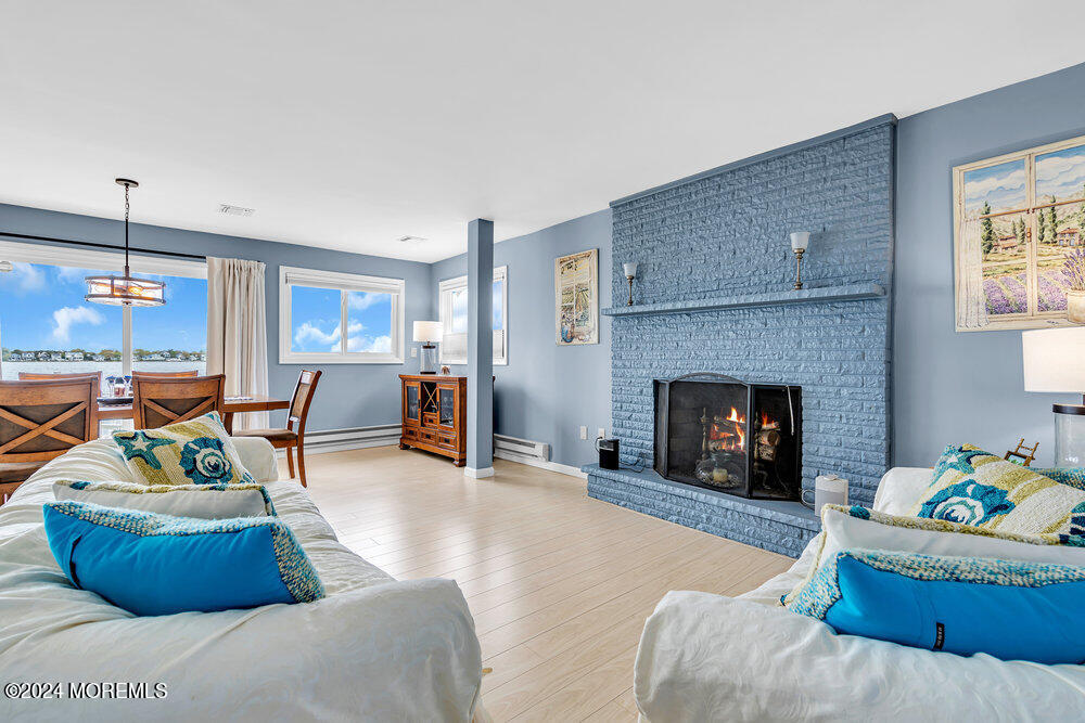 402 A Mantoloking Road Brick, NJ 08723 - Photo 4 of 51 a living room with furniture and a fireplace