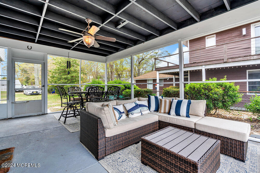 402 A Mantoloking Road Brick, NJ 08723 - Photo 43 of 51 a living room with furniture and a large window