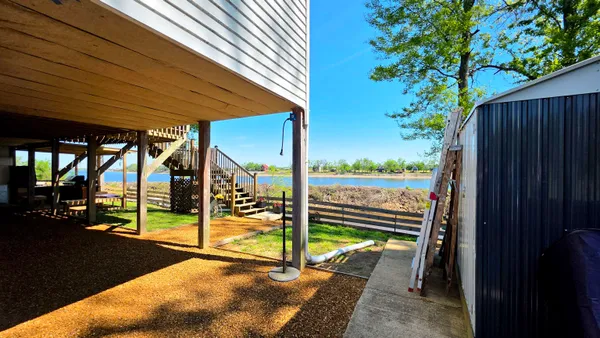 a view of a lake with a outdoor space