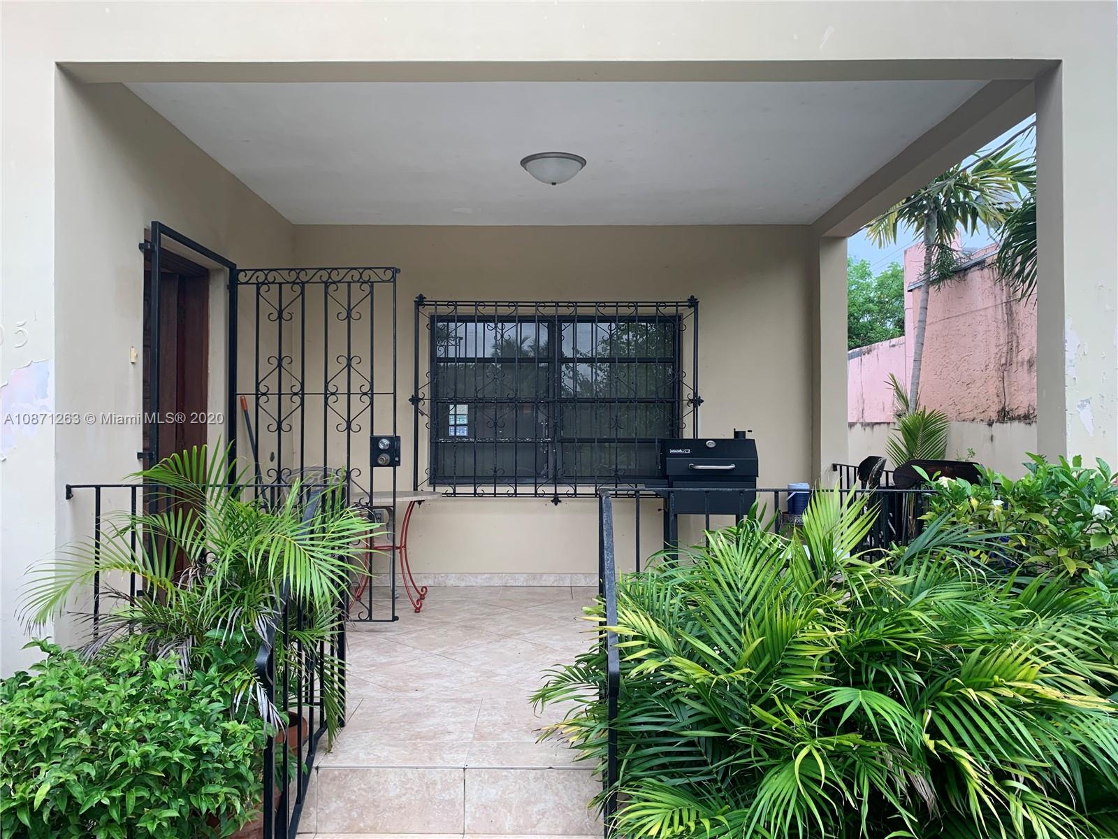 105 Southwest 22nd Road Miami, FL 33129 - Photo 3 of 26 a view of a entryway door of the house