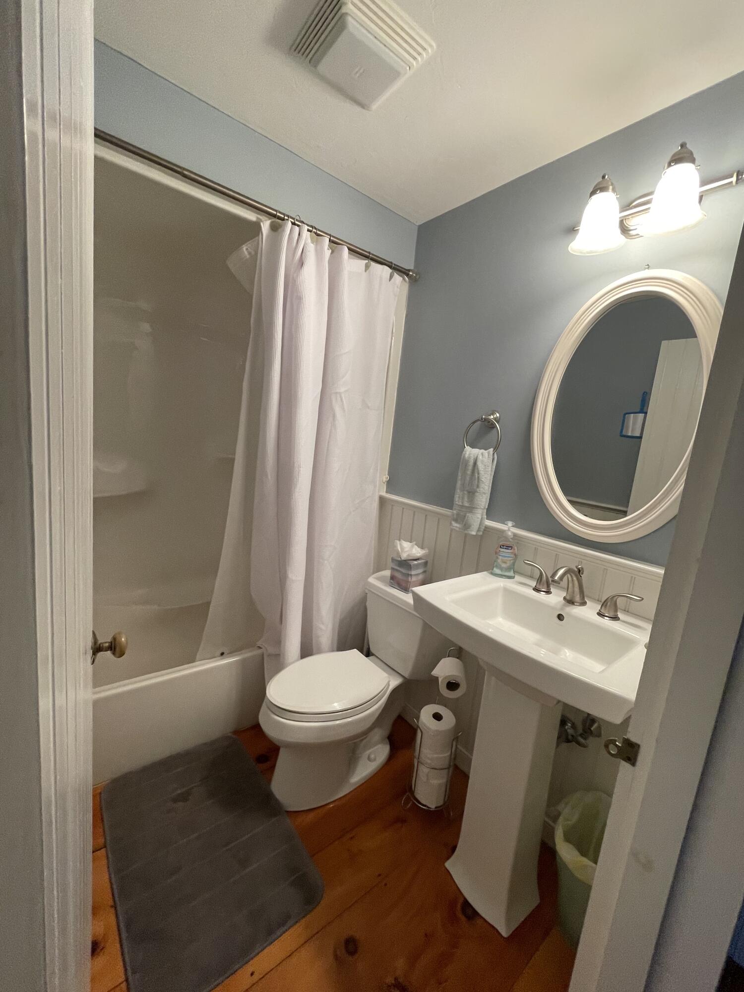 4 Colemans Way Mashpee, MA 02649 - Photo 19 of 27 a bathroom with a sink toilet a mirror and shower