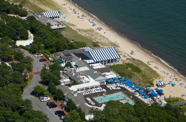 a front view of house with outdoor space swimming pool and seating