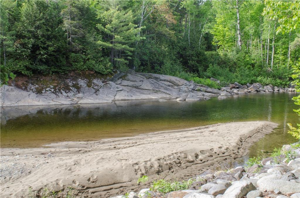 1032 Poplar Stream Road Kingfield, ME 04947 - Photo 2 of 26 The shore of the Carrabassett River...