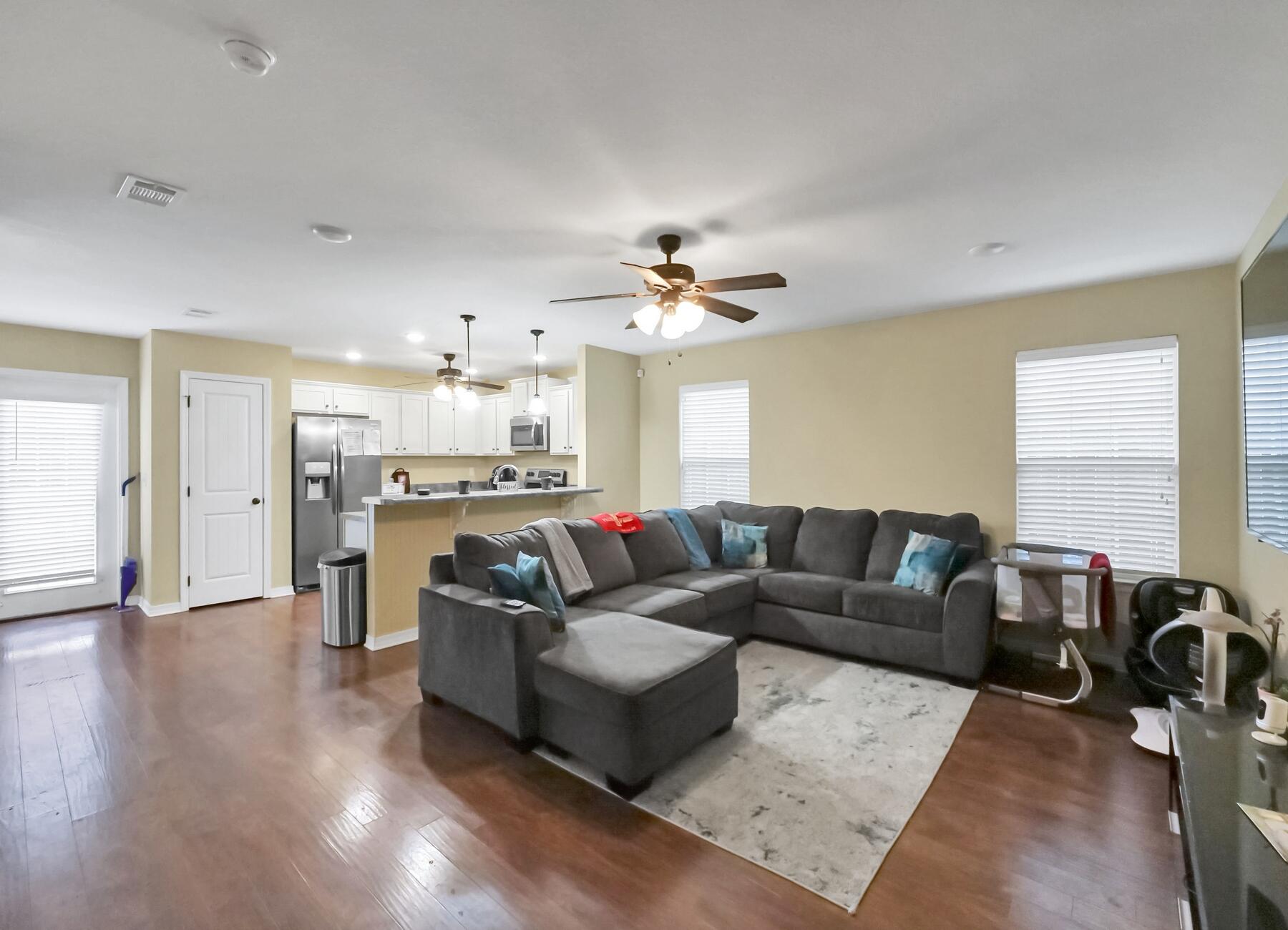 220 Wainwright Drive Crestview, FL 32539 - Photo 15 of 56 a living room with furniture and kitchen view