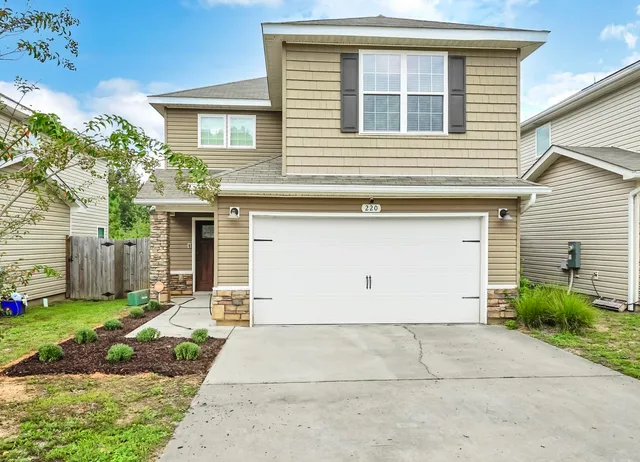 a front view of house with yard