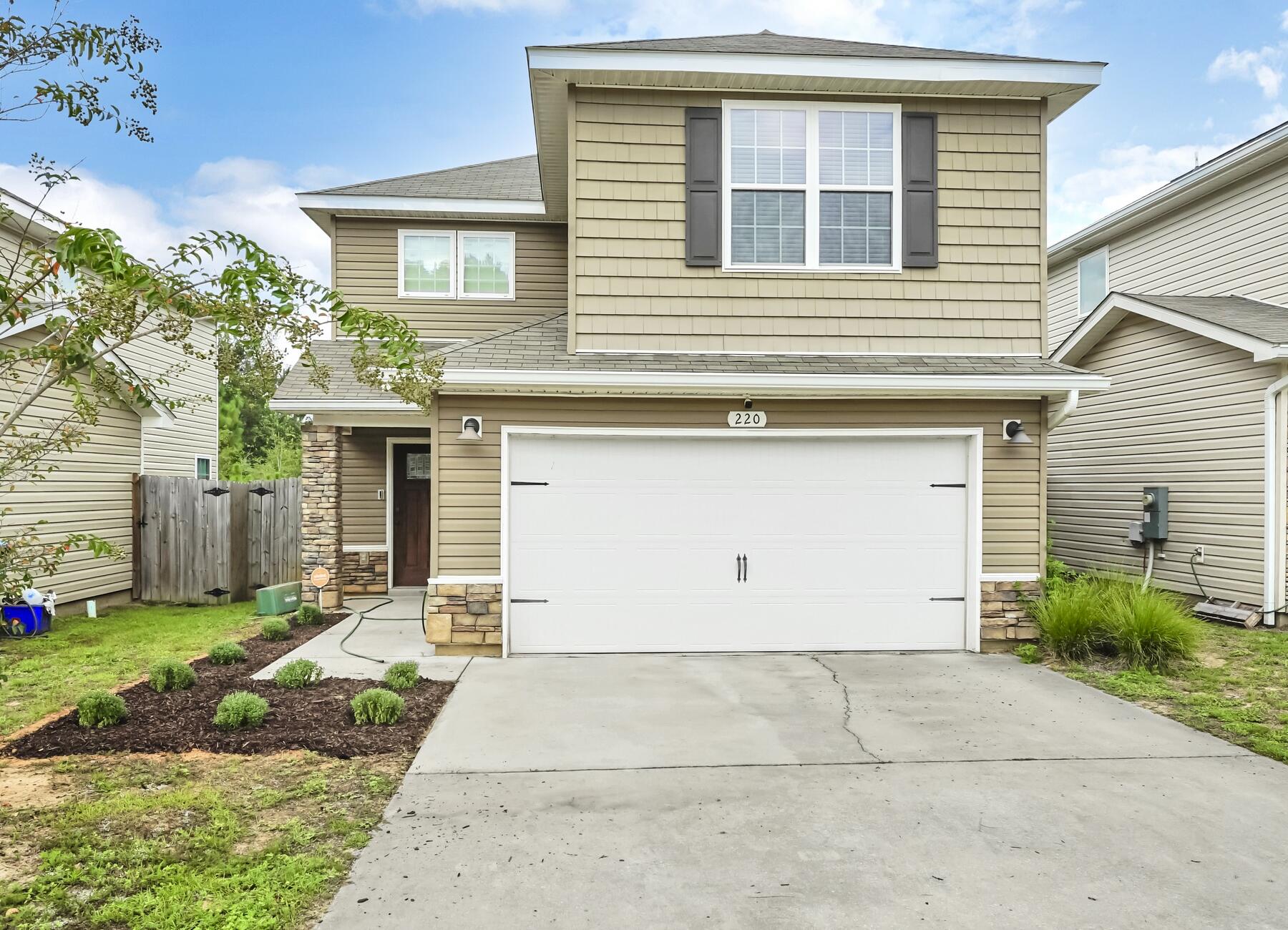 220 Wainwright Drive Crestview, FL 32539 - Photo 2 of 56 a front view of house with yard