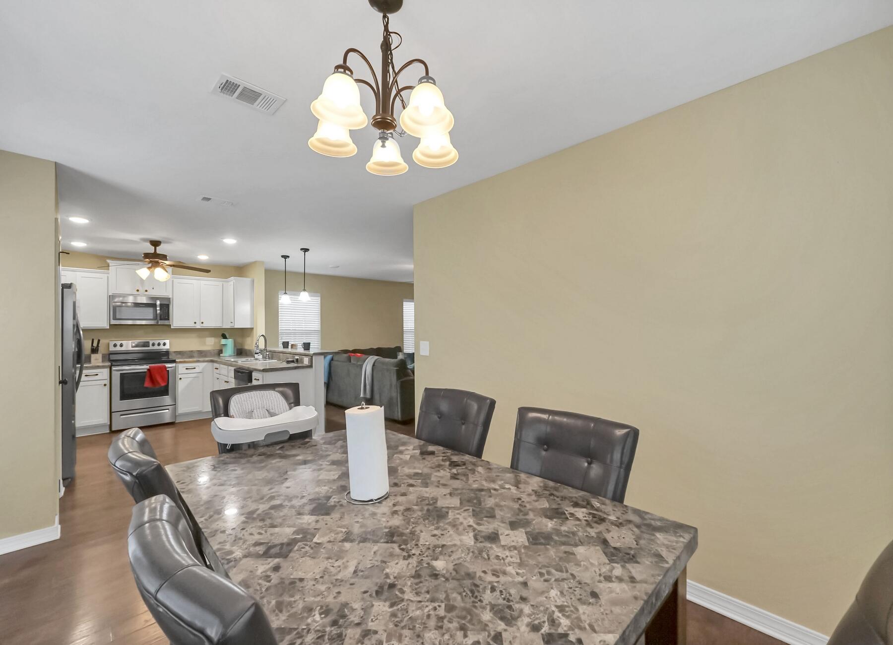 220 Wainwright Drive Crestview, FL 32539 - Photo 25 of 56 a view of a dining room with furniture