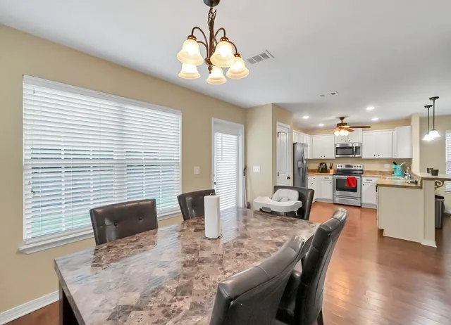 a bedroom with a bed and a tv