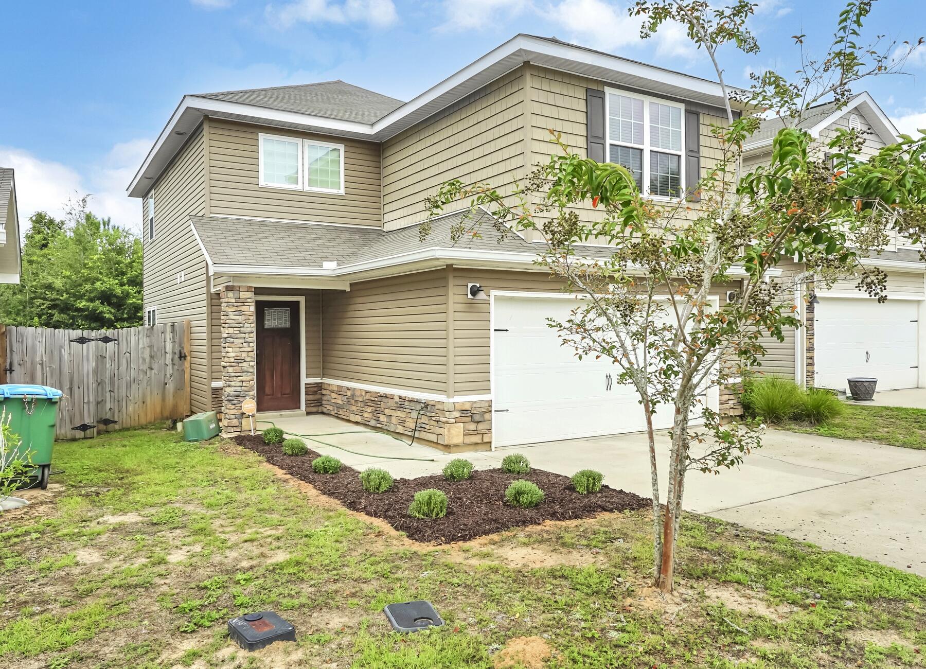 220 Wainwright Drive Crestview, FL 32539 - Photo 4 of 56 a view of a house with a yard