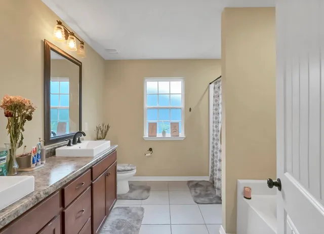 an empty room with a flat screen tv