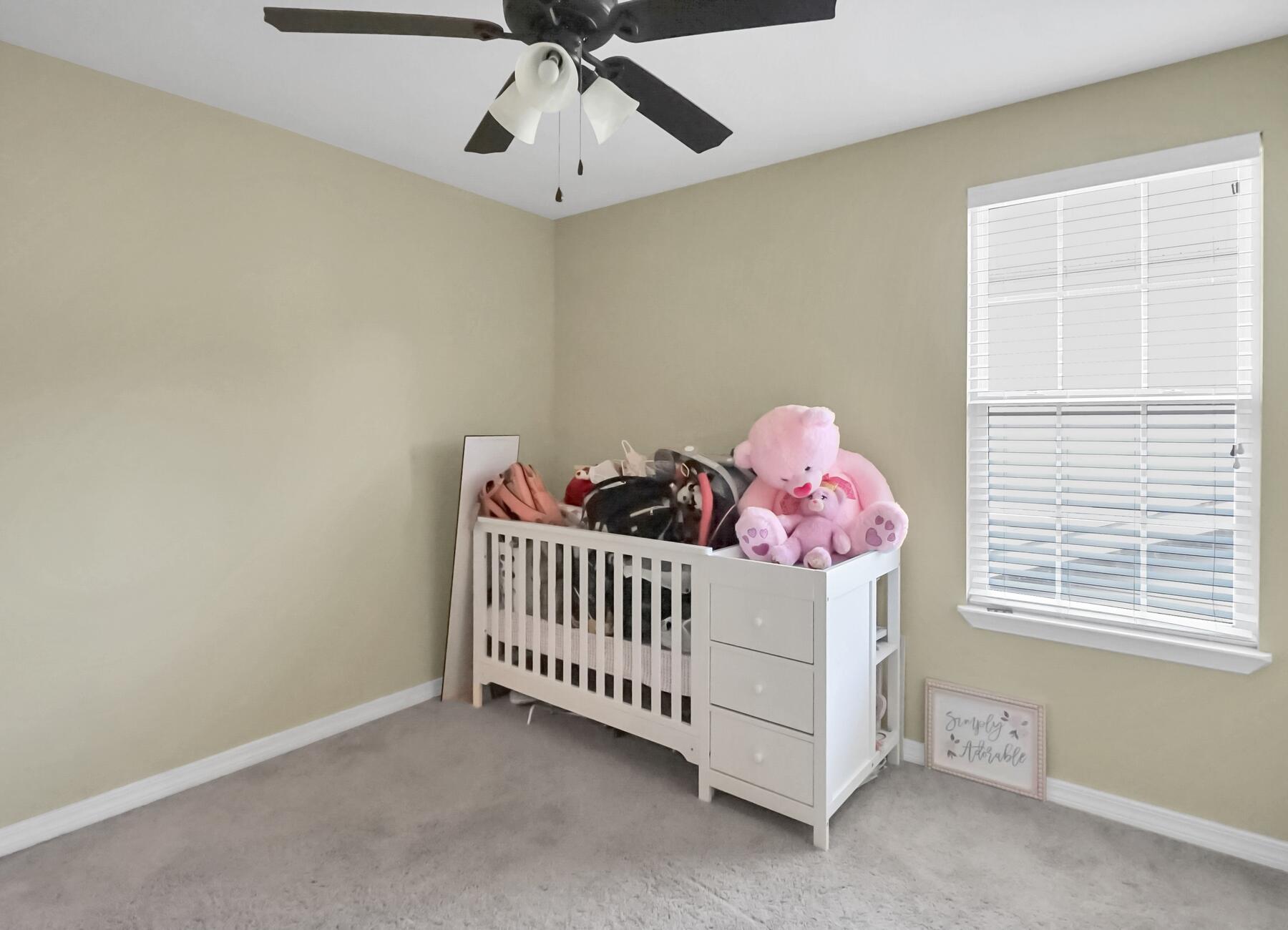 220 Wainwright Drive Crestview, FL 32539 - Photo 49 of 56 a bedroom with a bed and window