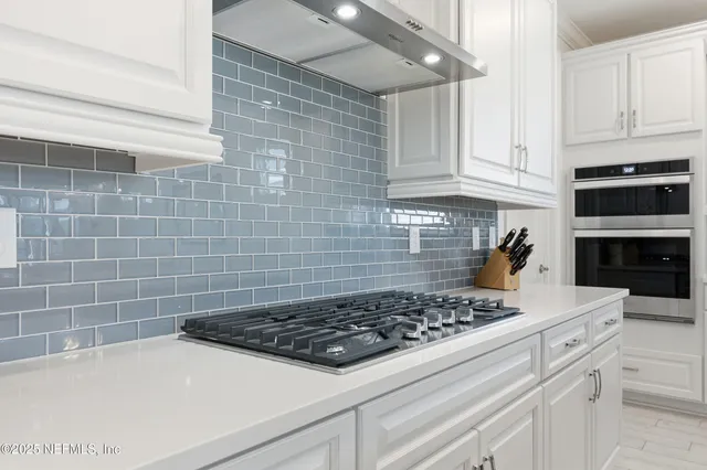 a view of swimming pool with seating area