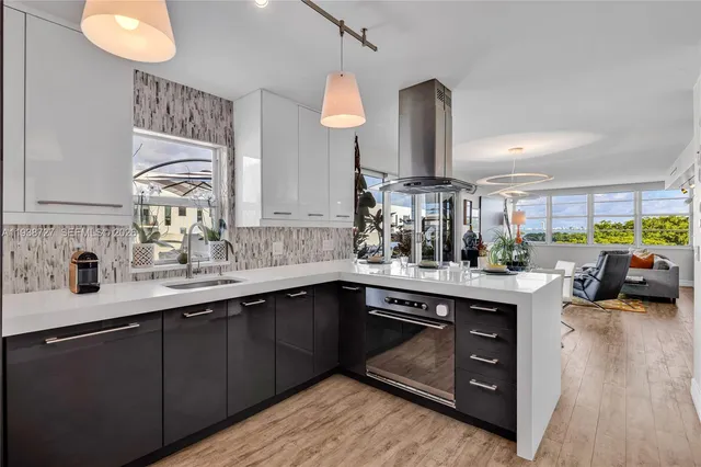 a kitchen with lots of counter space and a sink