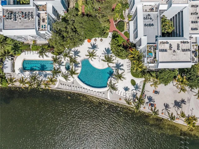 a view of swimming pool with chairs