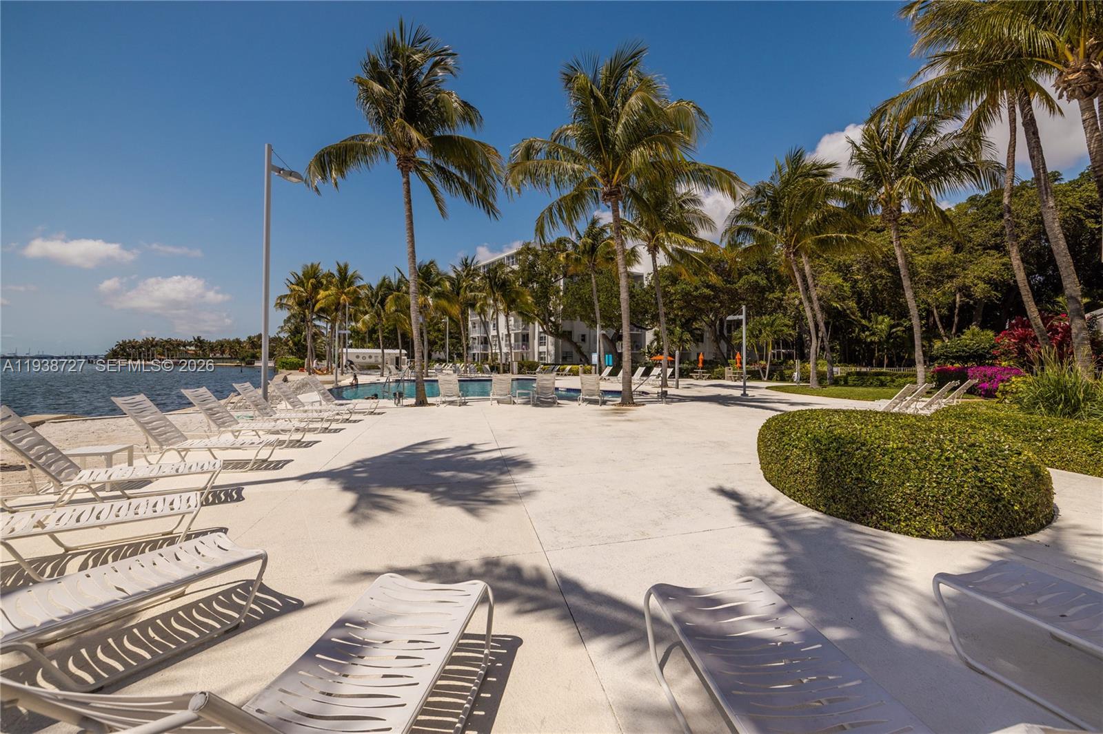 680 Northeast 64th Street, Unit APH3 Miami, FL 33138 - Photo 34 of 38 a view of a backyard of the house