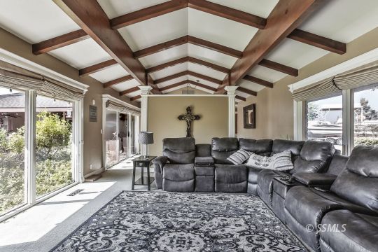 1509 Welcome Way Ridgecrest, CA 93555 - Photo 12 of 50 a living room with furniture and a large window