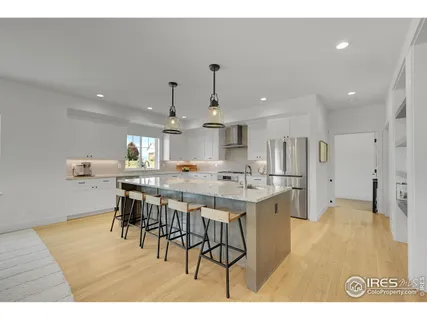 a book shelf with glass shelves