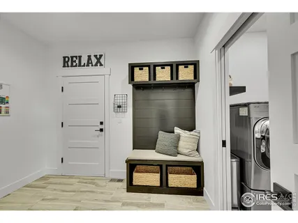 a bedroom with a bed couch and window