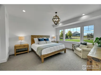 a bathroom with a sink toilet a mirror and bathtub