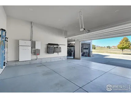 a living room with lots of furniture and a flat screen tv