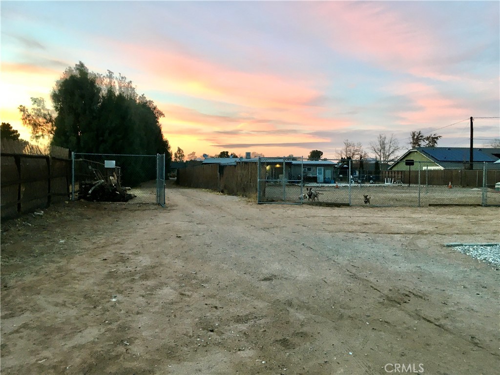 14121 Lakota Road Apple Valley, CA 92307 - Photo 30 of 40 Back house driveway