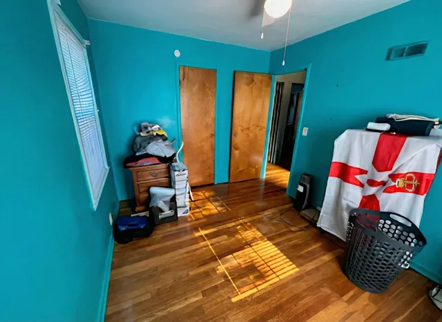 a room with furniture and a flat screen tv