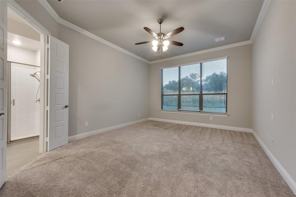 611 Windy Ridge Lane Rockwall, TX 75087 - Photo 23 of 36 Primary Bedroom