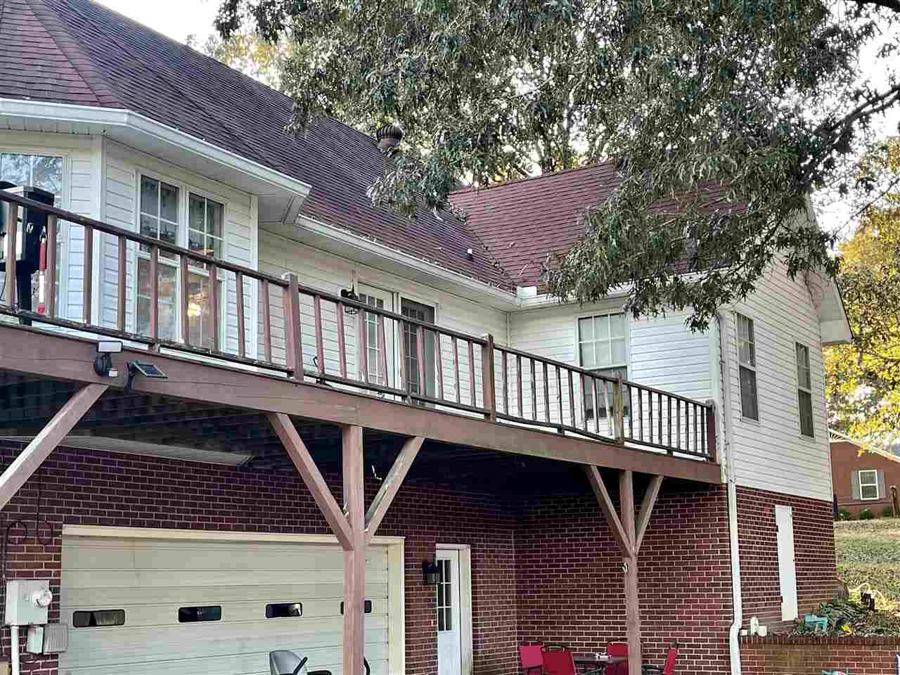 315 Rich Road Savannah, TN 38372 - Photo 16 of 20 a front view of a house with a balcony