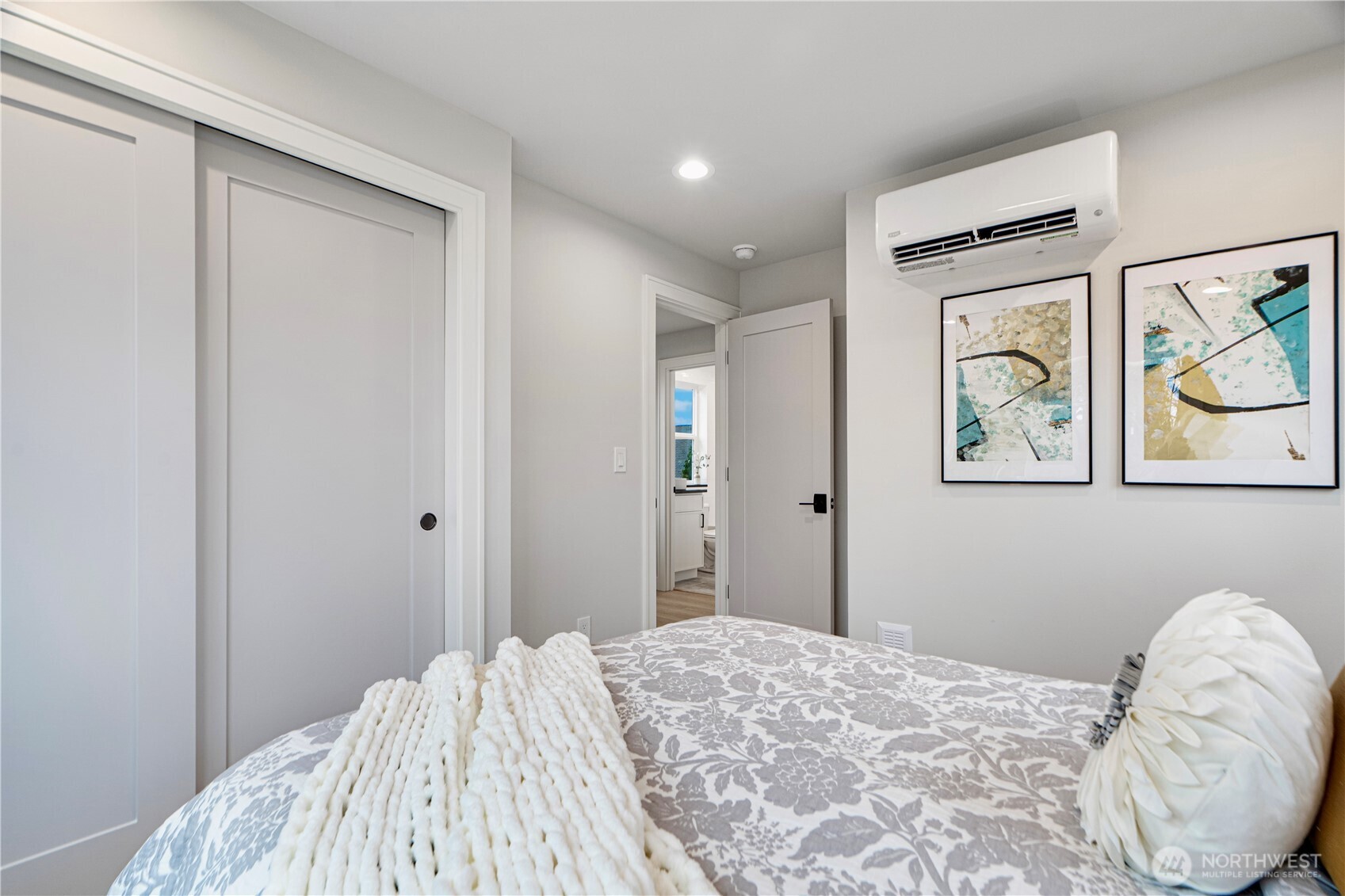 3054 Fairmount Avenue Southwest Seattle, WA 98116 - Photo 14 of 18 a bedroom with a bed and cupboard