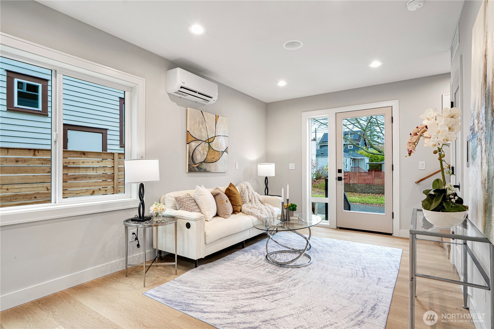 3054 Fairmount Avenue Southwest Seattle, WA 98116 - Photo 5 of 18 a living room with furniture and a large window