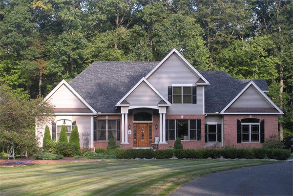 Lot 8 Florence Road Northampton, MA 01062 - Photo 1 of 30 a front view of a house with a garden