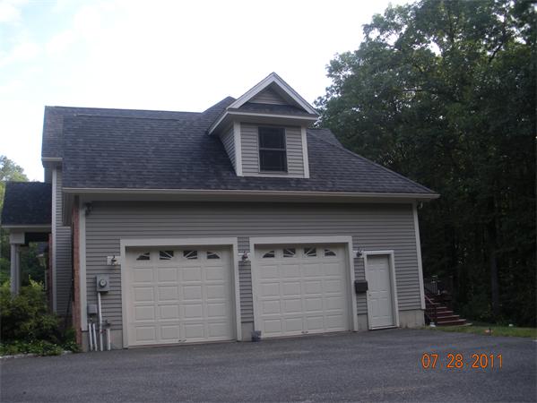 Lot 8 Florence Road Northampton, MA 01062 - Photo 4 of 30 a front view of a house with a yard
