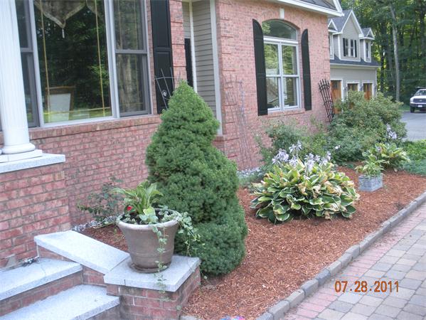Lot 8 Florence Road Northampton, MA 01062 - Photo 9 of 30 front view of a house with potted plants