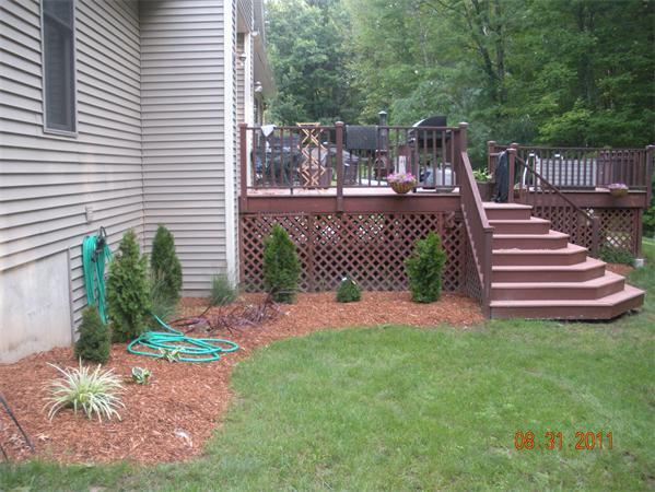 Lot 8 Florence Road Northampton, MA 01062 - Photo 10 of 30 a view of a yard with plants and wooden fence