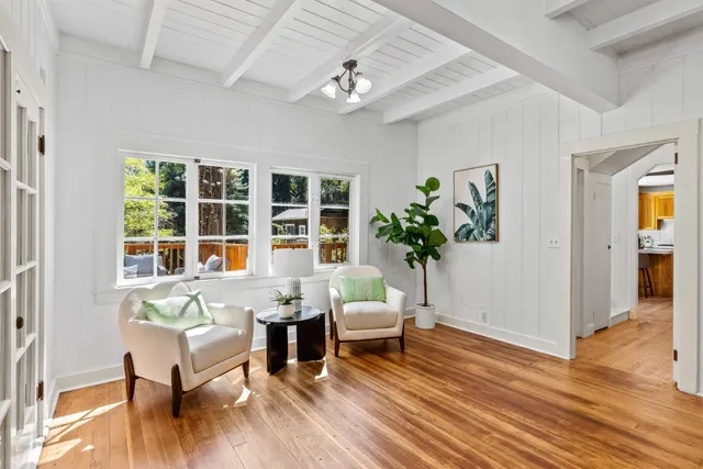 a kitchen with stainless steel appliances granite countertop a sink a stove and cabinets