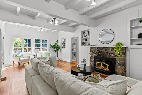 a kitchen with wooden cabinets and a sink