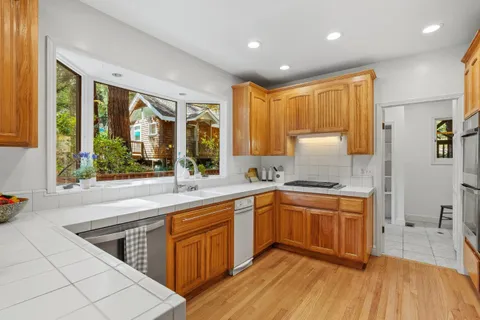 a bed room with a bed and a chair