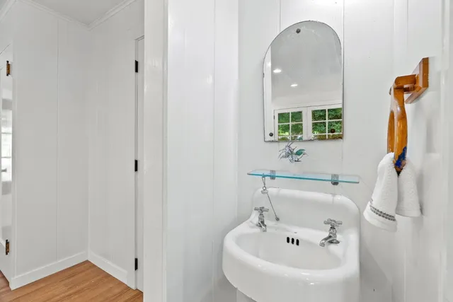 a house view with a sitting space and garden