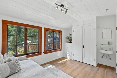 a view of a living room and dining room