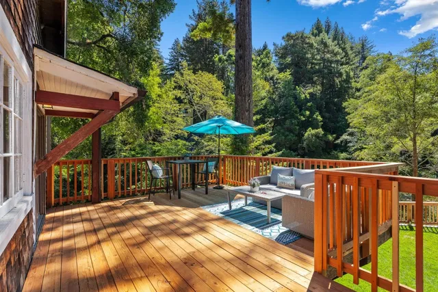 a kitchen with stainless steel appliances a stove a sink and a cabinets