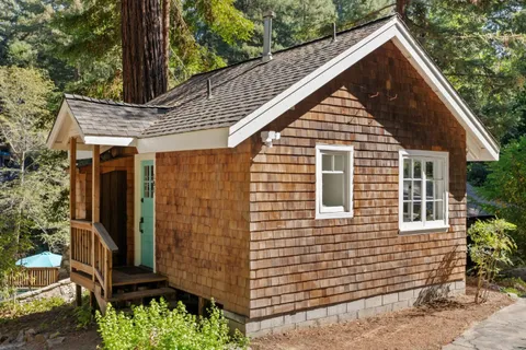an outdoor space with furniture and umbrella