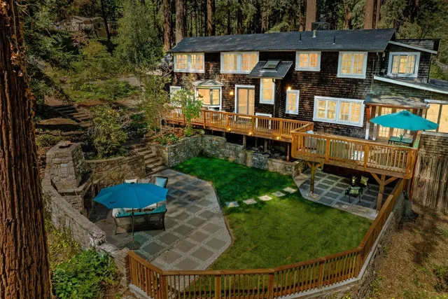 a view of a chair and table in the garden