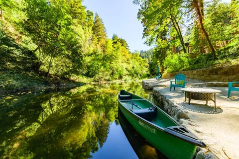 a living room with furniture windows and wooden floor