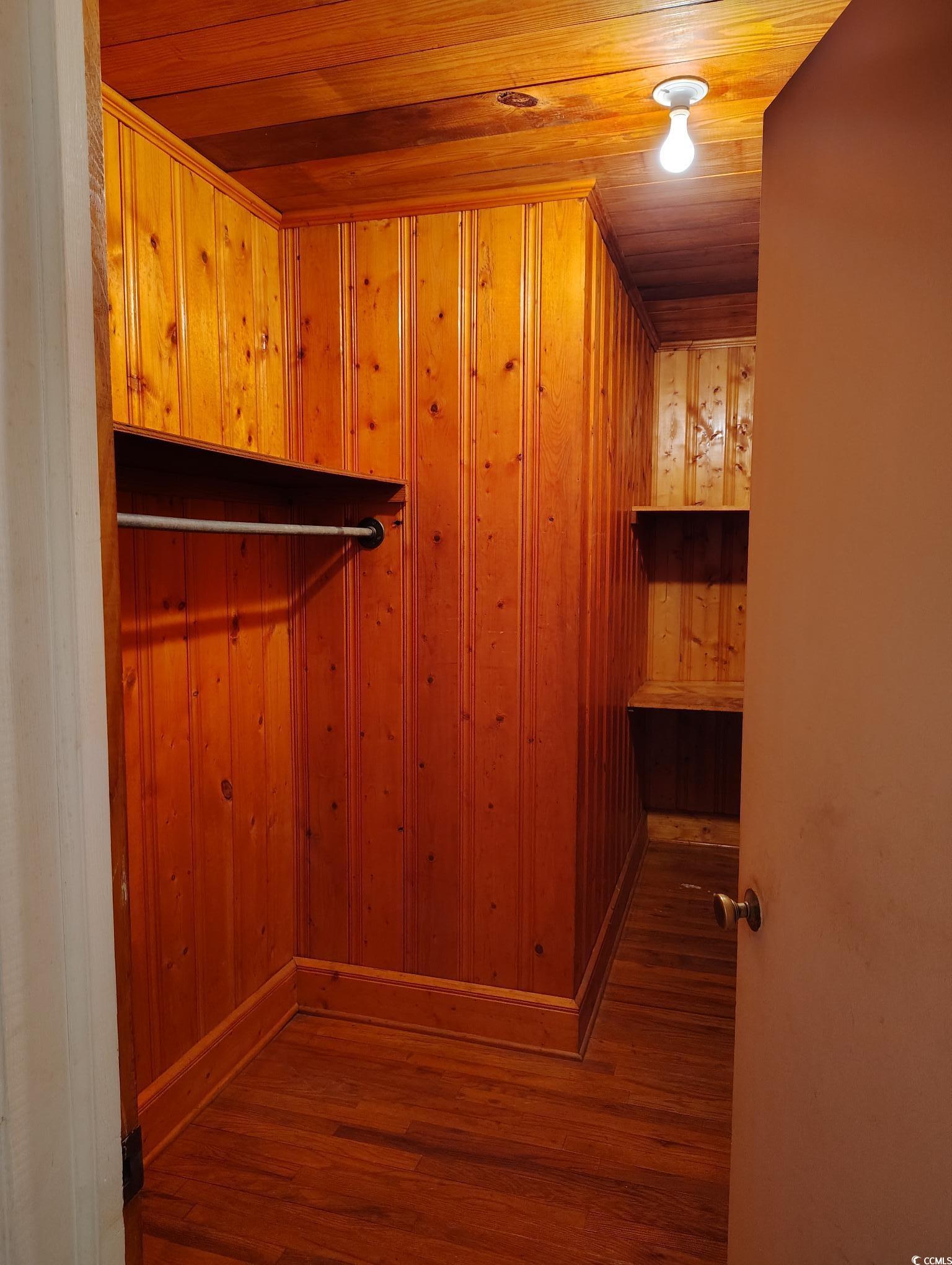 1375 Kenny Jordan Road Tabor City, NC 28463 - Photo 15 of 15 Walk in closet featuring wood finished floors