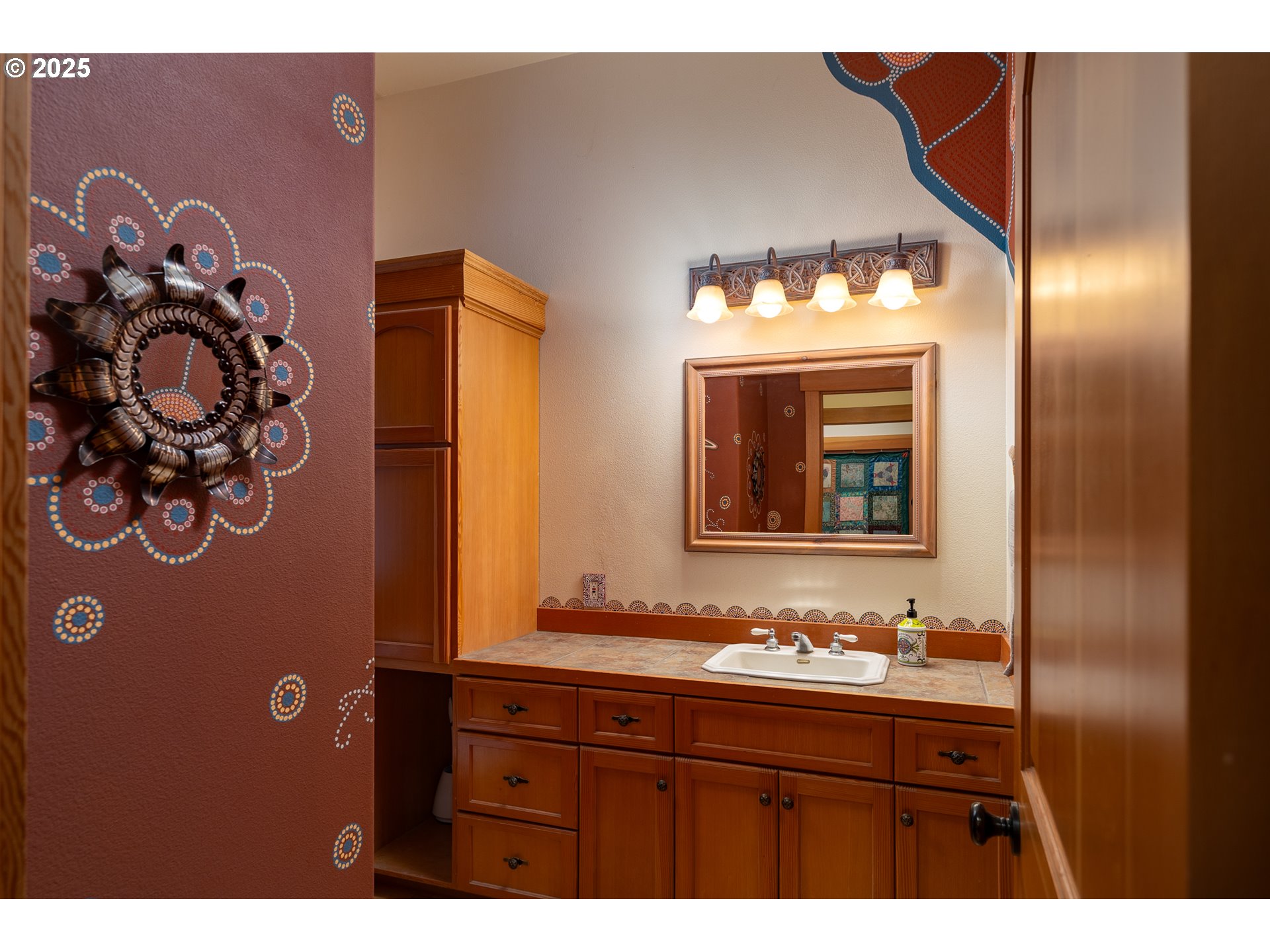 22091 South Ridge Road Oregon City, OR 97045 - Photo 21 of 48 a bathroom with a sink and a mirror