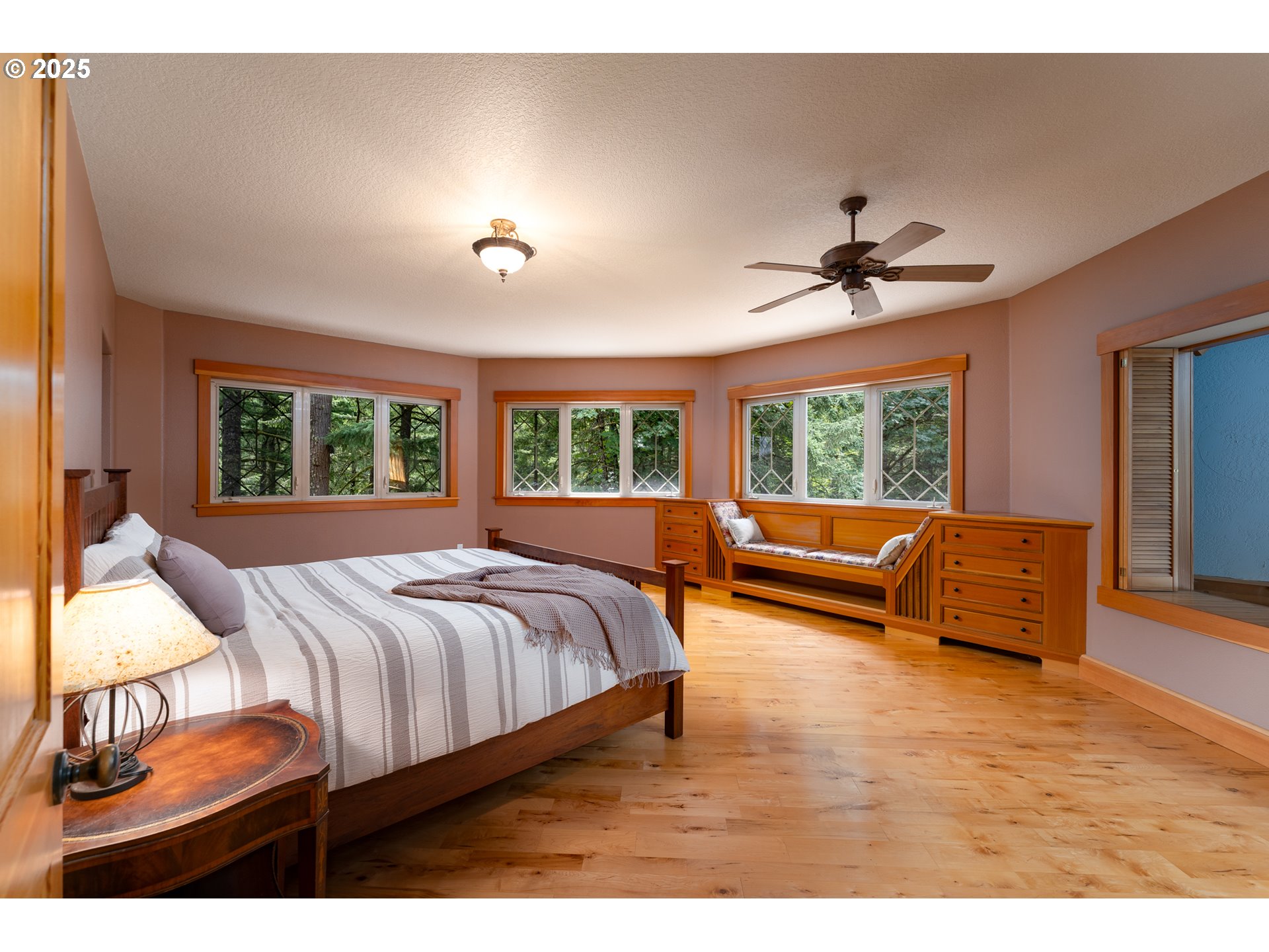 22091 South Ridge Road Oregon City, OR 97045 - Photo 24 of 48 a bedroom with a large bed and a window
