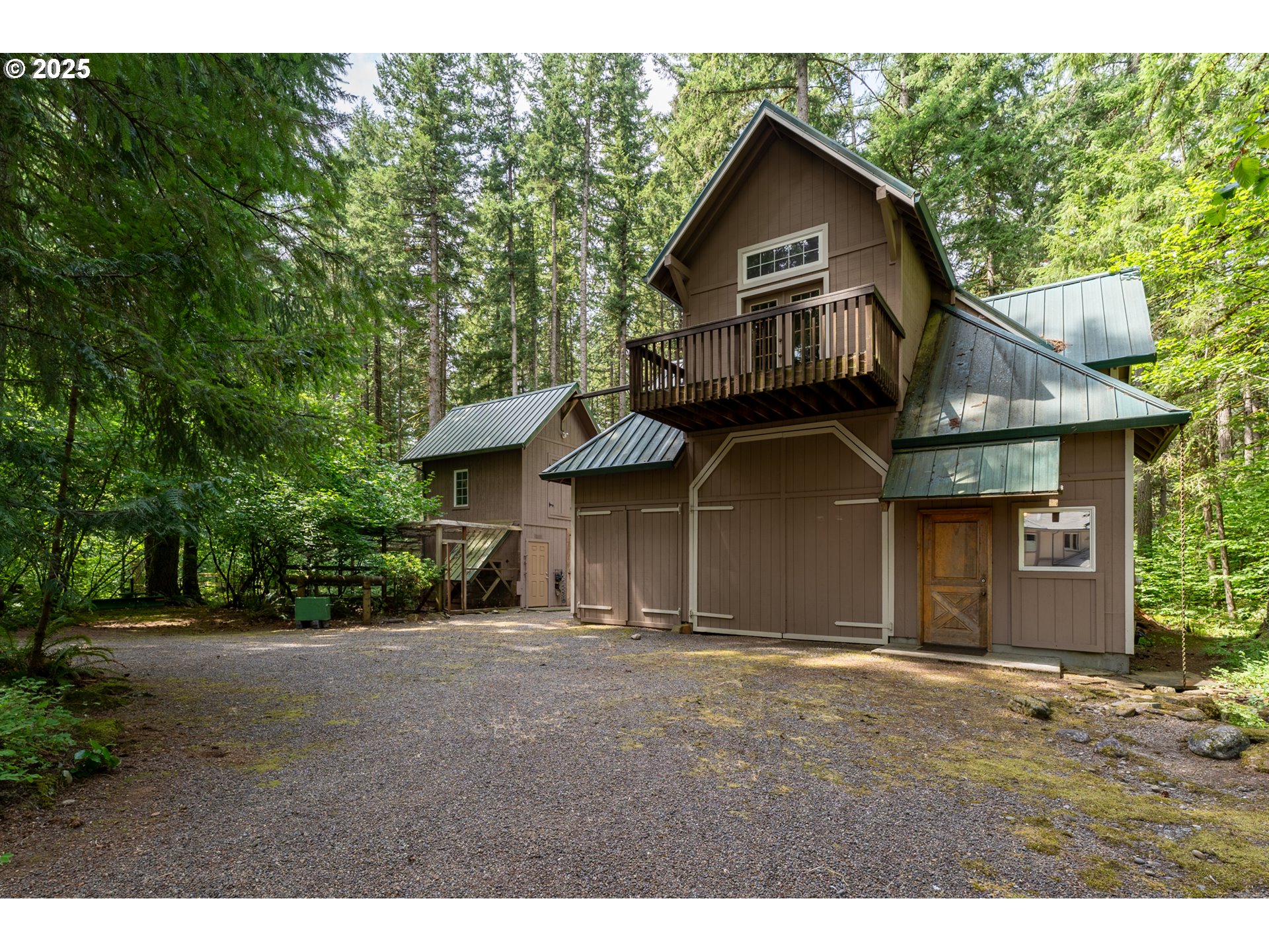 22091 South Ridge Road Oregon City, OR 97045 - Photo 38 of 48 a front view of a house with a garden